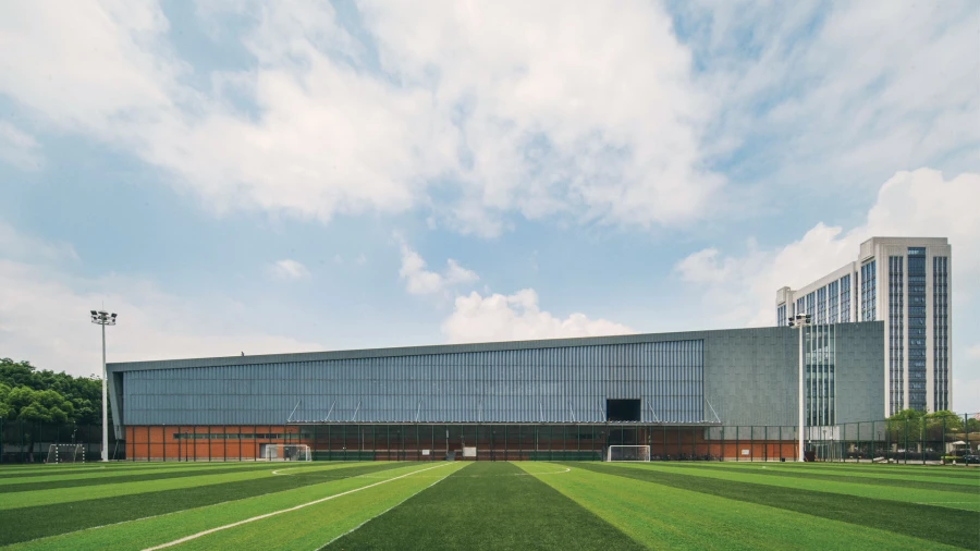 wuhan yangtze international school building view from the soccer field